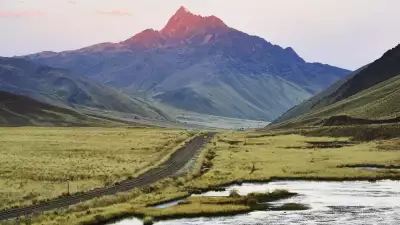 The Andes behind the tracks of the Belmond Andean Explorer