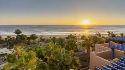 Enjoy 365 days a year of sun and sunsets at Paradis Plage in Taghazout, Morocco