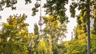 The TV Tower on Alexanderplatz seen from a park