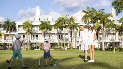 Kids playing croquet