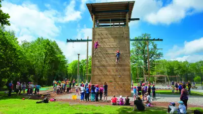Ascending the climbing wall