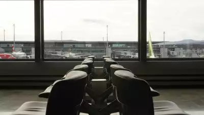 A row of chairs sitting in front of a window
