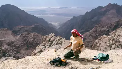 Eid Azzazmeh prepares mint tea on a mountaintop