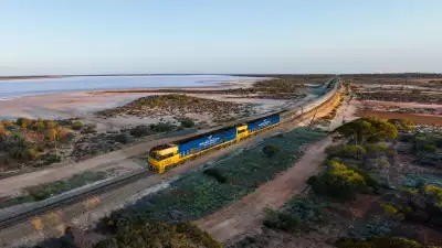 The Indian Pacific passing Lake Julia, in Western Australia