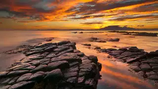 Fiery-Sky-over-the-Isle-of-Arran,-Firth-of-Clyde,-Scotland-by-Peter-Ribbeck-(Take-a-view,-2013)