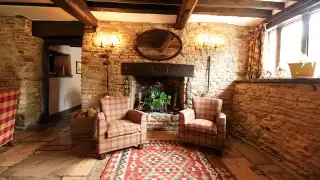 Cosy up by the fire in The Cotswolds