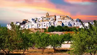 Medieval fortified town of Ostuni at sunset, Puglia, Italy