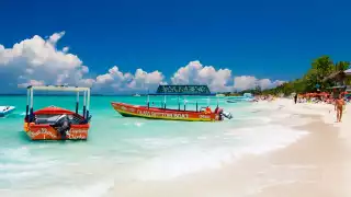 Sea, sand and boats at Seven Mile Beach, Negril