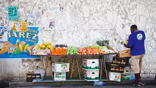 A fruit seller at work in barbados