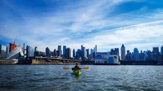 Lone kayaker on the hudson river