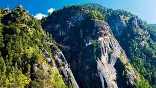 Prayer flags hanging across Taktsang Dzong