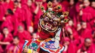 Masked dancer at a festival in Bhutan