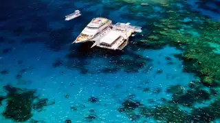 Yacht and deck at Agincourt Reef