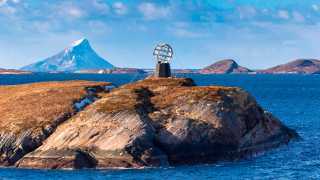 Arctic Circle globe sign on Vikingen Island, Norway