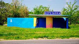 Blue and yellow bus shelter in Ukraine