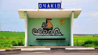 A bus stop painted with a ship in Ukraine