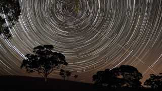 The International Space Station amongst star trails in Australia