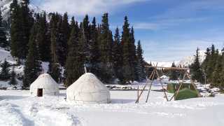 Camp of yurts in Kyrgyzstan snow resort
