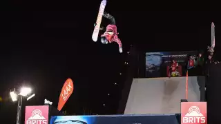 Snowboarder doing a backflip at the Telegraph Ski & Snowboard Show