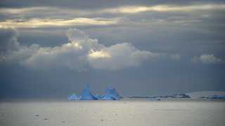 Triangular blue iceberg in Antarctica