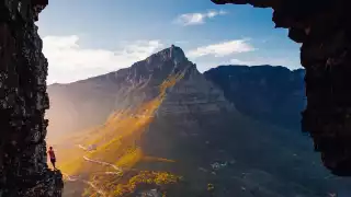 Hiker on the edge of Lion's Head near Cape Town in South Africa