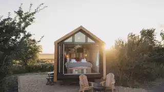 Cabin by canopy and stars