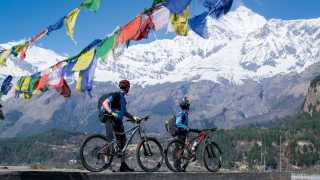 Mountain biking at the foot of the Himalayas in Nepal