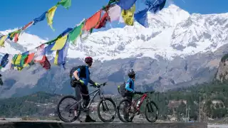 Mountain biking at the foot of the Himalayas in Nepal