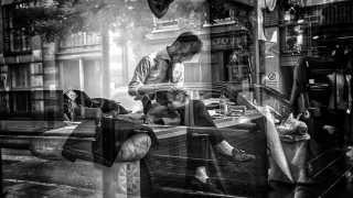 Reflections in the window of a tailor shop on Lambs Conduit Street