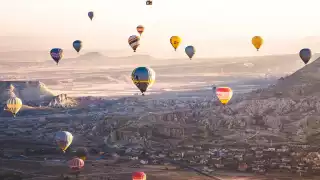 Hot air balloons flying over Cappadocia, Turkey