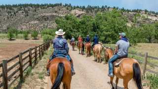Horseback riding at the Sylvan Dale Guest Ranch. Colorado. USA