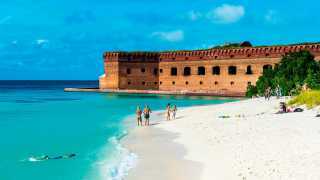 White sand beach and turquoise waters in front of Fort Jefferson, Dry Tortugas National Park, Florida, United States