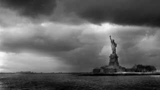 Statue of Liberty in storm clouds, New York, black and white, by Serge Ramelli