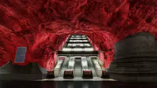 Red painted mural at Solna Centrum metro station, Stockholm