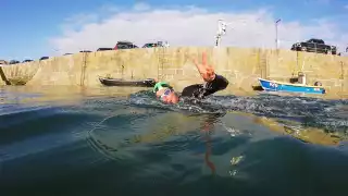 Wild swimming on the coast of Cornwall, UK