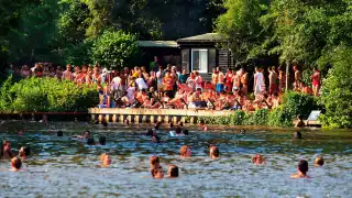 Swimmers at Hampstead Mixed Pond, north London