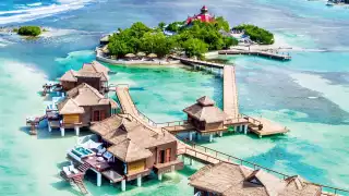 Aerial view of over the water villas at Sandals