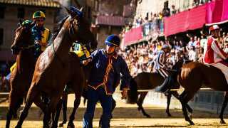 Riders in Il Palio horse race, Siena, Italy