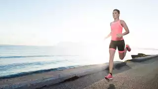 Female runner in 2XU compression garments