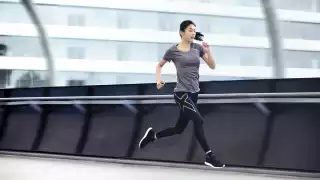 Female runner in 2XU compression garments