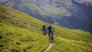 Riding a downhill section of the GR58 route in the southern French Alps