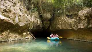 Exploring caves in a kayak in Belize