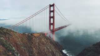 San Francisco's Golden Gate Bridge in the mist over San Francisco Bay