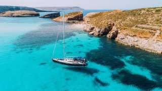 Yachting in Blue Lagoon, off the island of Comino