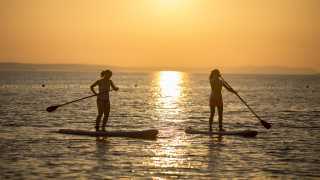 Standup paddle boarding with Neilson at Alana Beach Club, Croatia