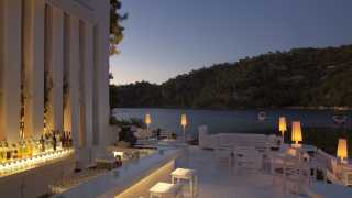 Outdoor dining at Hillside Beach Club luxury resort