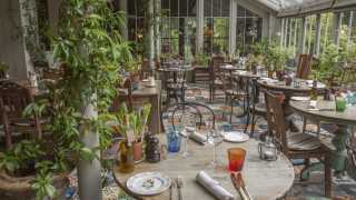 The conservatory dining room at The Pig at Brockenhurst, in the New Forest
