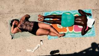 Sunbathers at Astoria Pool in Queens, New York City