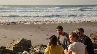 Friends on the beach in Cornwall