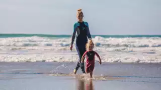 Family on the beach in Cornwall